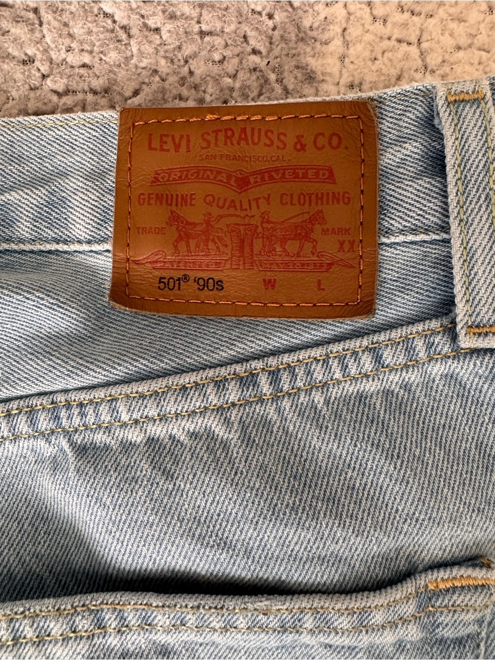 Levi's Light Blue Straight Leg Jeans with Brown Leather Patch